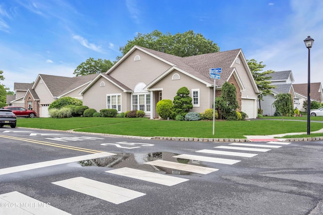 143 Sylvan Lake Blvd, Bayville, NJ 08721 - view of front of home featuring a front lawn and a shingled roof