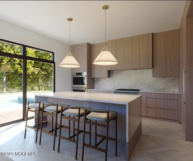 889 Red Oaks Dr, Elberon, NJ 07740 - kitchen with modern cabinets, a center island, double oven, and backsplash