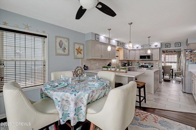 728 Drum Point Rd, Brick, NJ 08723 - dining area with ceiling fan and light wood-style flooring