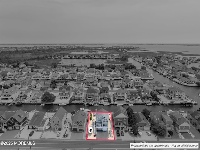 728 Drum Point Rd, Brick, NJ 08723 - aerial perspective of suburban area with a nearby body of water and property boundaries highlighted