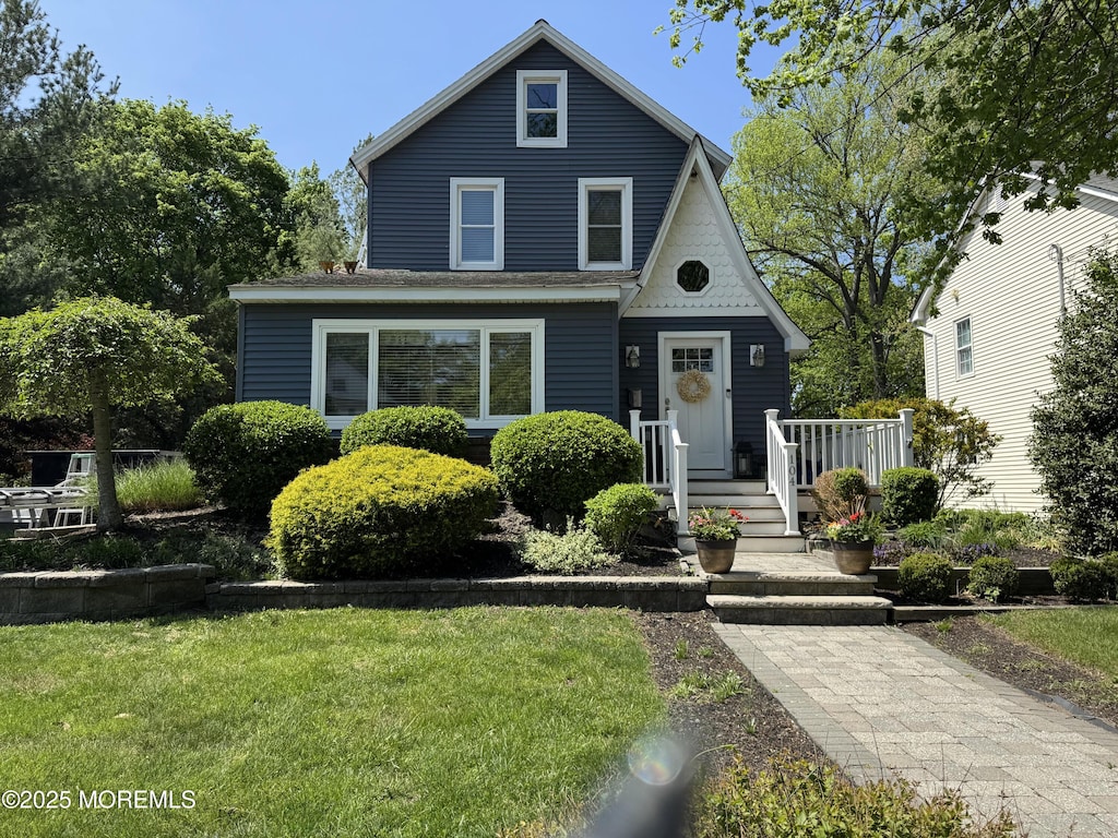 104 Harrison Ave, Red Bank, NJ 07701 - view of front of house with a front yard