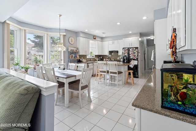 14 Tuscan Dr, Freehold, NJ 07728 - dining room featuring light tile patterned floors and recessed lighting