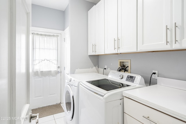 14 Tuscan Dr, Freehold, NJ 07728 - laundry room featuring cabinet space, washing machine and clothes dryer, and light tile patterned floors