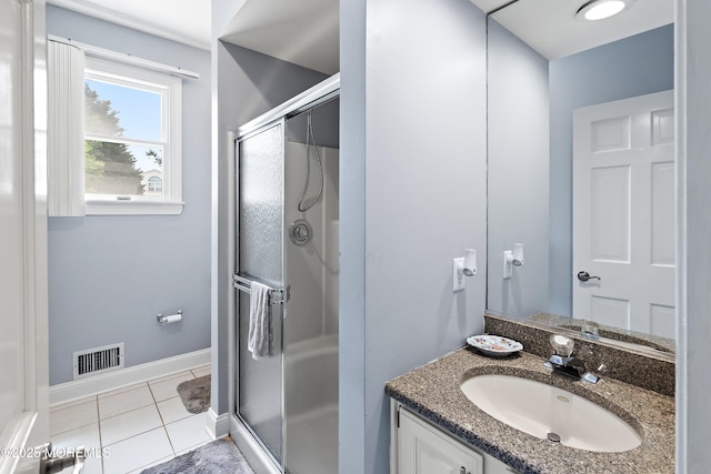 14 Tuscan Dr, Freehold, NJ 07728 - full bathroom featuring vanity, a stall shower, tile patterned floors, and baseboards