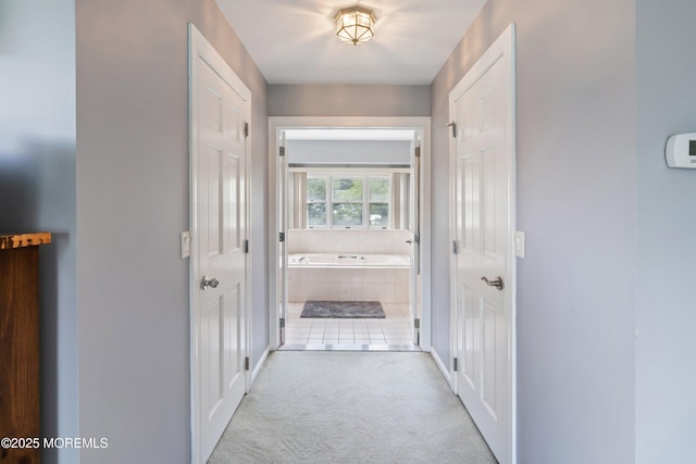 14 Tuscan Dr, Freehold, NJ 07728 - hall featuring carpet floors and baseboards
