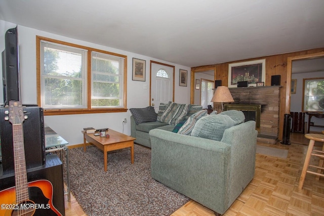 1801 Serpentine Dr, Forked River, NJ 08731 - living room featuring a brick fireplace and wood walls