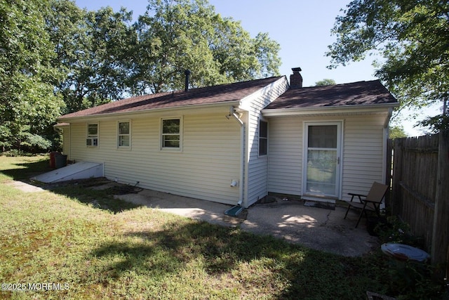 1801 Serpentine Dr, Forked River, NJ 08731 - back of property with a chimney and a patio