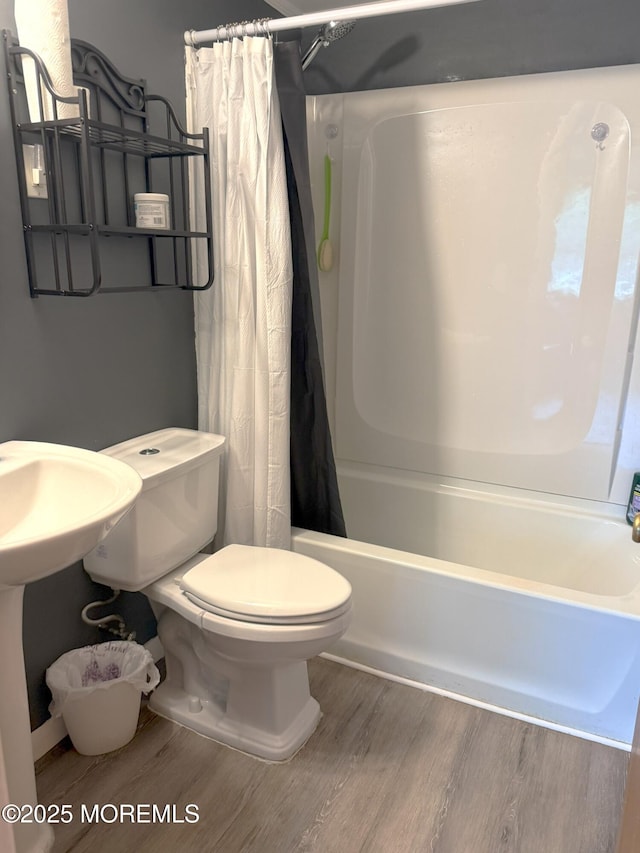 1801 Serpentine Dr, Forked River, NJ 08731 - full bathroom featuring toilet, wood finished floors, and shower / bath combo