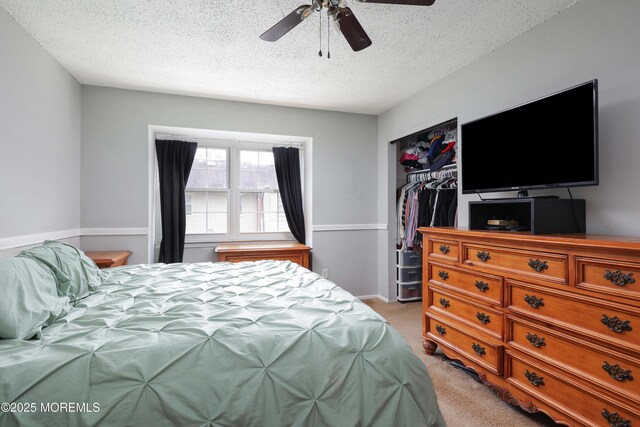 1184 Rachel Ct, Brick, NJ 08724 - bedroom featuring light colored carpet, a textured ceiling, a closet, and ceiling fan