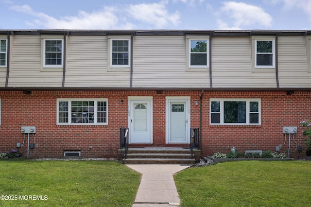 1184 Rachel Ct, Brick, NJ 08724 - view of property featuring a front lawn and brick siding