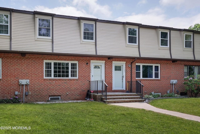 1184 Rachel Ct, Brick, NJ 08724 - townhome / multi-family property featuring a front yard and brick siding
