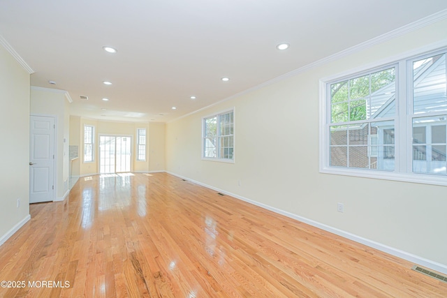 147 Old Bridge Tpke, East Brunswick, NJ 08816 - spare room with crown molding, baseboards, plenty of natural light, light wood finished floors, and recessed lighting