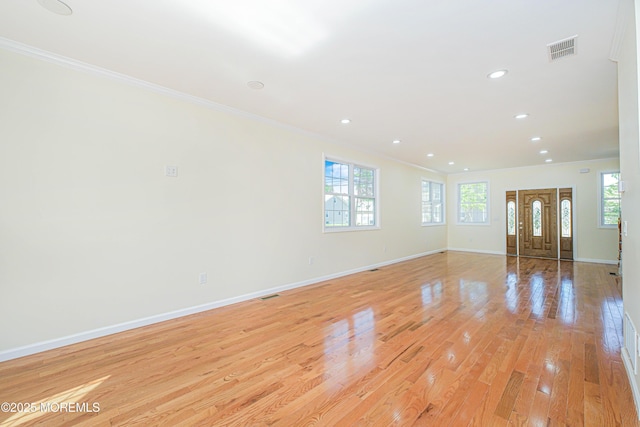 147 Old Bridge Tpke, East Brunswick, NJ 08816 - unfurnished living room with ornamental molding, baseboards, light wood-style flooring, and recessed lighting