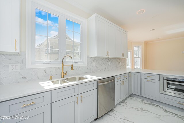147 Old Bridge Tpke, East Brunswick, NJ 08816 - kitchen featuring dishwasher, oven, a sink, light marble finish flooring, and light countertops