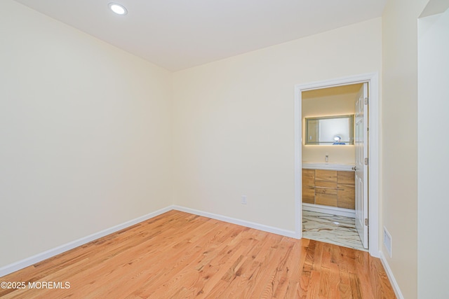 147 Old Bridge Tpke, East Brunswick, NJ 08816 - spare room featuring light wood-style floors, baseboards, and recessed lighting