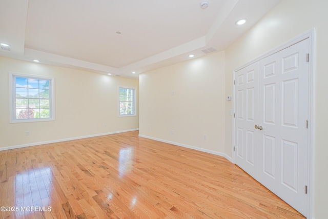 147 Old Bridge Tpke, East Brunswick, NJ 08816 - unfurnished room featuring a tray ceiling, light wood finished floors, recessed lighting, baseboards, and a smoke detector