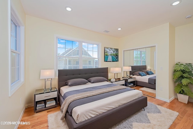 147 Old Bridge Tpke, East Brunswick, NJ 08816 - bedroom with light wood-style floors, baseboards, and recessed lighting