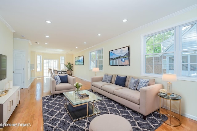 147 Old Bridge Tpke, East Brunswick, NJ 08816 - living room with healthy amount of natural light, ornamental molding, light wood-style floors, and recessed lighting