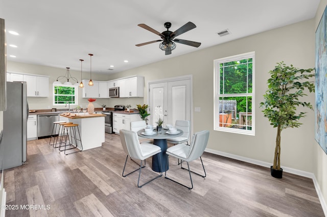 2 Sefel Ave, Cream Ridge, NJ 08514 - dining area with light wood finished floors, a ceiling fan, recessed lighting, and baseboards
