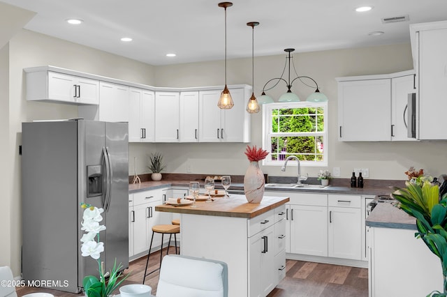 2 Sefel Ave, Cream Ridge, NJ 08514 - kitchen featuring appliances with stainless steel finishes, a sink, a center island, wood finished floors, and butcher block countertops