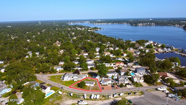 30 Corrigan Ave, Pine Beach, NJ 08741 - aerial view of property's location featuring property boundaries highlighted, a large body of water, and nearby suburban area