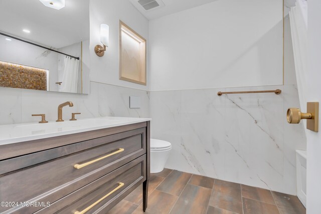 214 Private Way, Lakewood, NJ 08701 - full bathroom featuring vanity, toilet, tile walls, and curtained shower