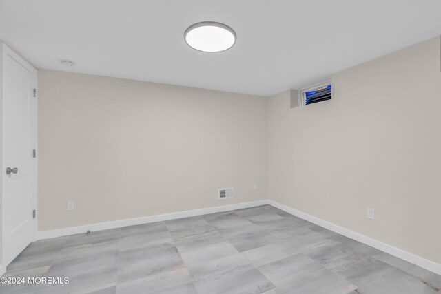 214 Private Way, Lakewood, NJ 08701 - empty room with baseboards and a smoke detector