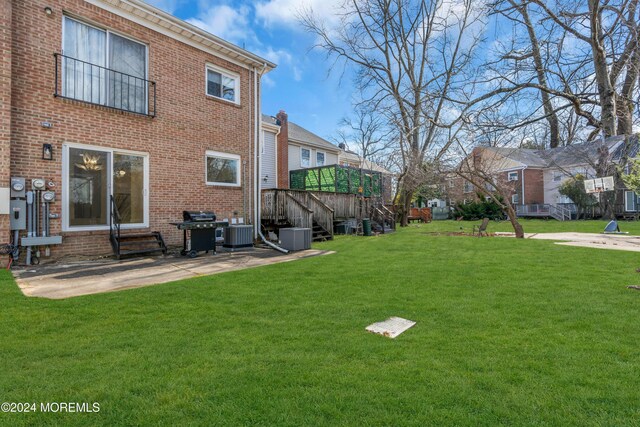 214 Private Way, Lakewood, NJ 08701 - view of green lawn with central air condition unit, a wooden deck, a patio area, and stairs
