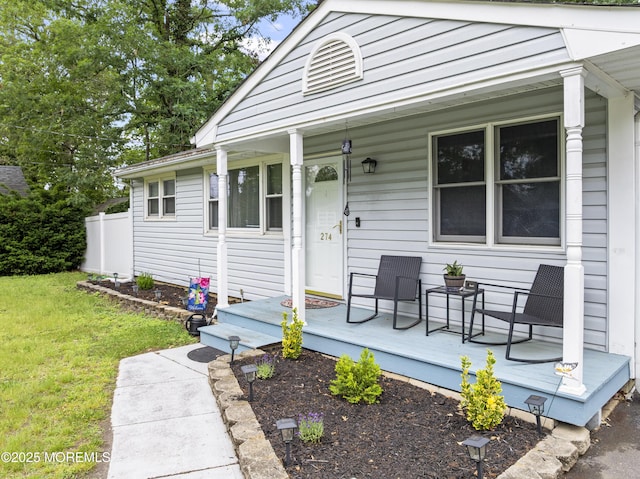 274 Falkenburgh Ave, Forked River, NJ 08731 - view of front facade with a porch and a front lawn