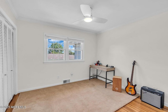 708 Schoolhouse Rd, Brielle, NJ 08730 - unfurnished bedroom with ornamental molding, a ceiling fan, a closet, and wood finished floors