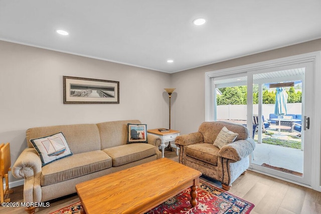 708 Schoolhouse Rd, Brielle, NJ 08730 - living room with light wood finished floors, recessed lighting, and crown molding