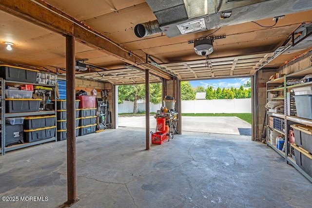 708 Schoolhouse Rd, Brielle, NJ 08730 - garage featuring a garage door opener