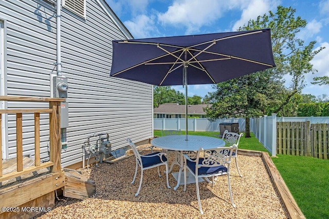 708 Schoolhouse Rd, Brielle, NJ 08730 - fenced backyard featuring outdoor dining area and a patio
