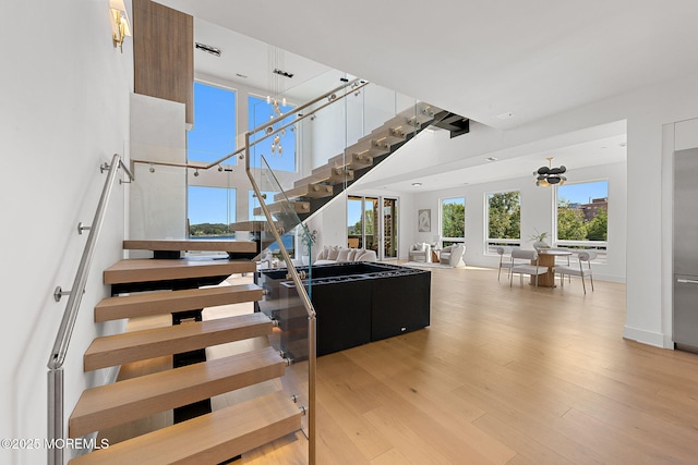 4 Boat Club Ct Unit 3E, Red Bank, NJ 07701 - stairs with wood finished floors and a high ceiling
