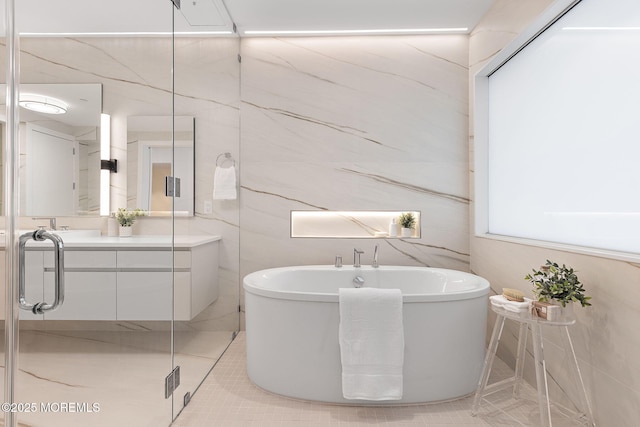 4 Boat Club Ct Unit 3E, Red Bank, NJ 07701 - full bathroom featuring a soaking tub, vanity, and tile patterned floors