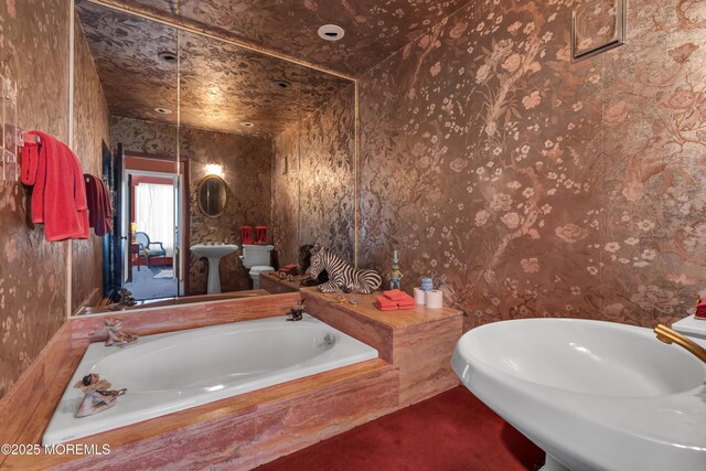310 Cooper Rd Unit C, Red Bank, NJ 07701 - bathroom featuring a bath and wallpapered walls