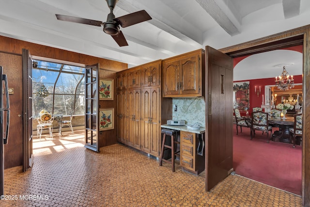 310 Cooper Rd Unit C, Red Bank, NJ 07701 - office area with wood walls, beam ceiling, ceiling fan, a chandelier, and arched walkways