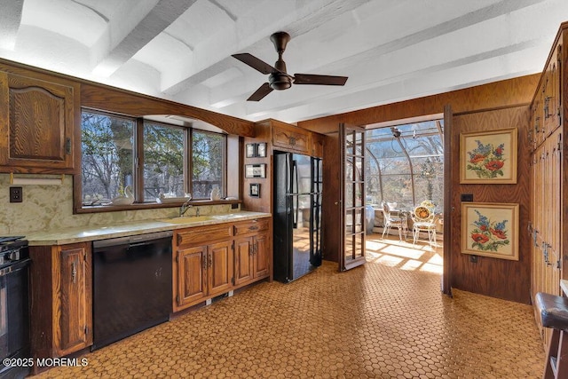 310 Cooper Rd Unit C, Red Bank, NJ 07701 - kitchen featuring black appliances, light countertops, ceiling fan, healthy amount of natural light, and beam ceiling