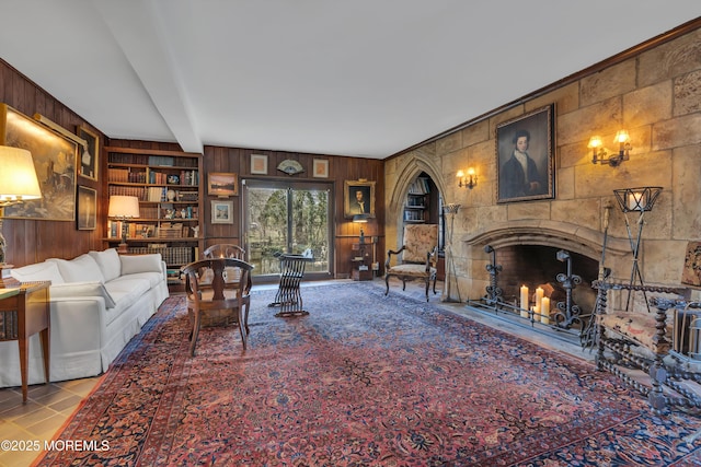 310 Cooper Rd Unit C, Red Bank, NJ 07701 - living area featuring wood walls, a large fireplace, beam ceiling, and built in features