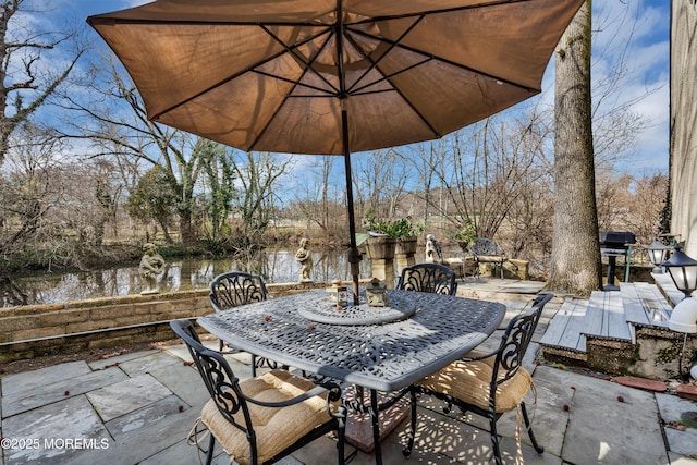 310 Cooper Rd Unit C, Red Bank, NJ 07701 - view of patio with outdoor dining space and a water view