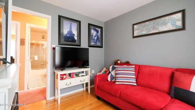 277 Grandview Ave, Piscataway Twp, NJ 08854 - living area featuring wood finished floors and baseboards
