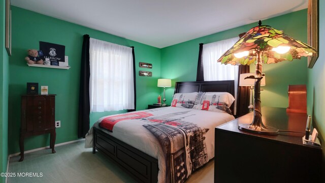 277 Grandview Ave, Piscataway Twp, NJ 08854 - carpeted bedroom featuring multiple windows and baseboards