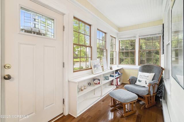 699 River Rd, Fair Haven, NJ 07704 - sunroom with healthy amount of natural light, hardwood / wood-style floors, and a baseboard heating unit