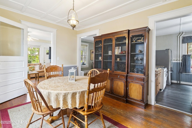 699 River Rd, Fair Haven, NJ 07704 - dining area featuring dark wood-style flooring, crown molding, and a ceiling fan
