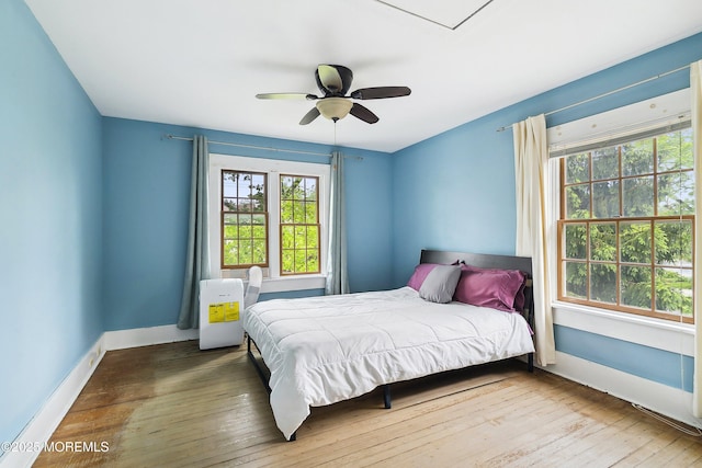 699 River Rd, Fair Haven, NJ 07704 - bedroom featuring wood-type flooring and a ceiling fan