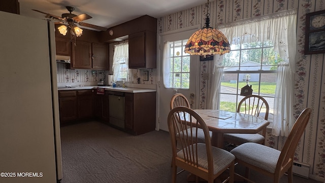 966A Argyll Cir, Lakewood, NJ 08701 - dining space featuring wallpapered walls, a ceiling fan, and light colored carpet
