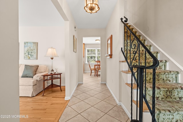 24 Sugar Maple Dr, Red Bank, NJ 07701 - entrance foyer with stairway and light wood-style flooring