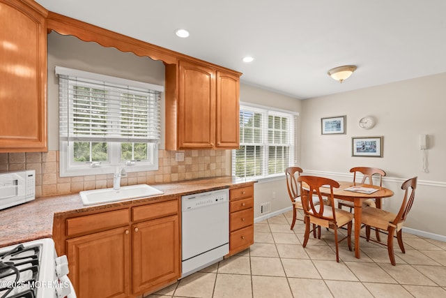 24 Sugar Maple Dr, Red Bank, NJ 07701 - kitchen with white appliances, decorative backsplash, light tile patterned flooring, recessed lighting, and brown cabinets