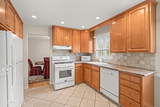 24 Sugar Maple Dr, Red Bank, NJ 07701 - kitchen featuring white appliances, under cabinet range hood, tasteful backsplash, light tile patterned flooring, and recessed lighting