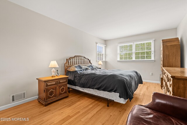 24 Sugar Maple Dr, Red Bank, NJ 07701 - bedroom with light wood-style floors and baseboards